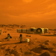 Artist’s concept of a crewed mission to Mars, along with habitats and pressurized rover.